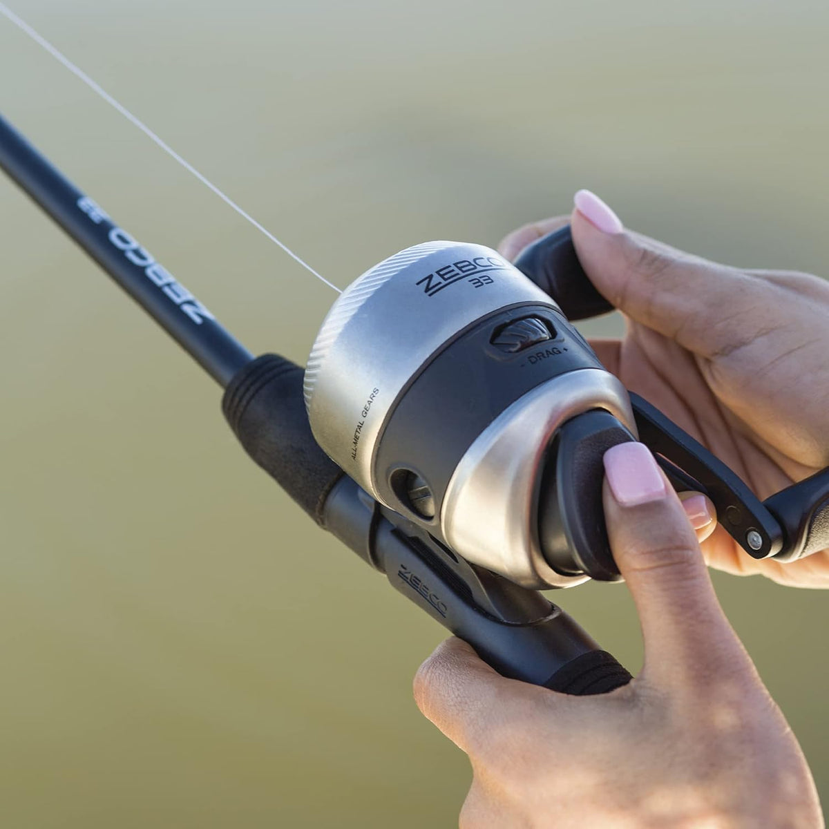 Silver/Black 6-Foot 2-Piece Fiberglass Spincast Reel and Fishing Rod Combo D40747